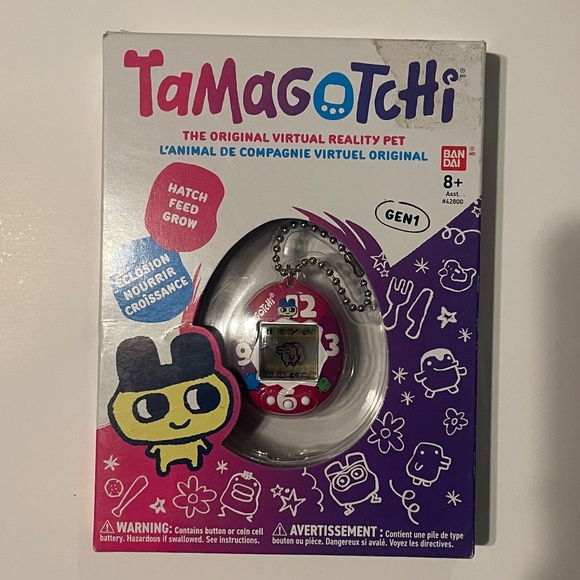 Tamagotchi Gen 1 The Original Virtual Reality Pet - Purple Pink Clock Shell - Picture 1 of 2